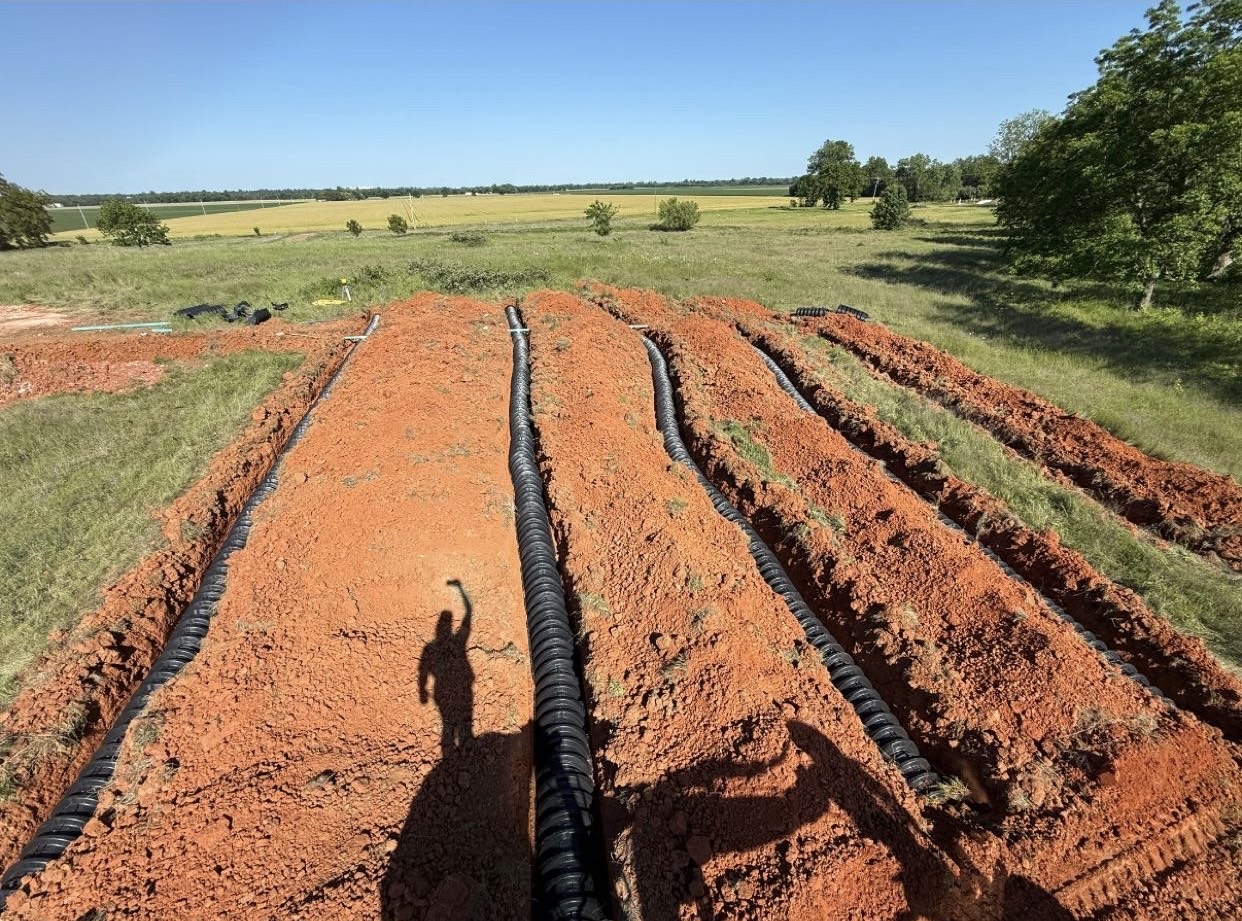 Freshly installed septic drain field lateral lines